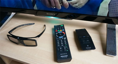 Remote controls, 3D glasses and metal feet stand
